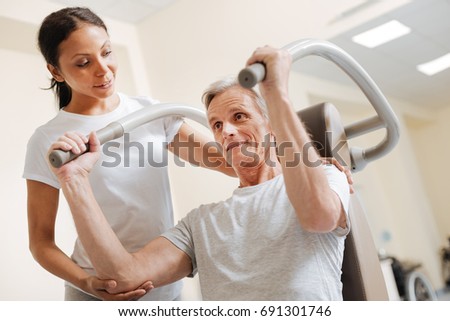 Low angle picture of healthy man that training his arms
