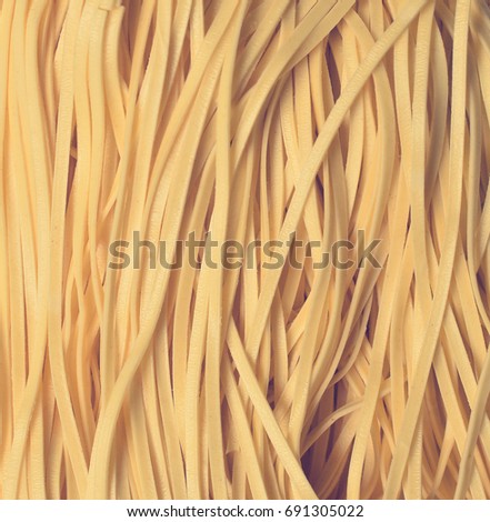 Background of egg noodles close-up.