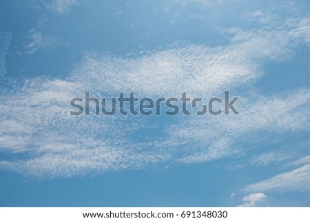 cloudy with blue sky background