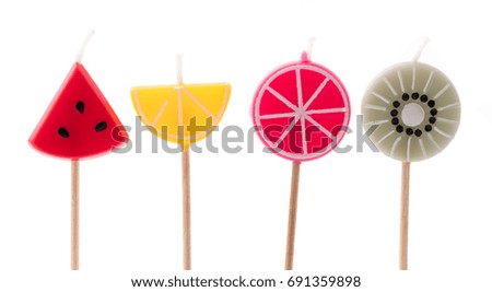 fancy fruits of candles isolated on white background