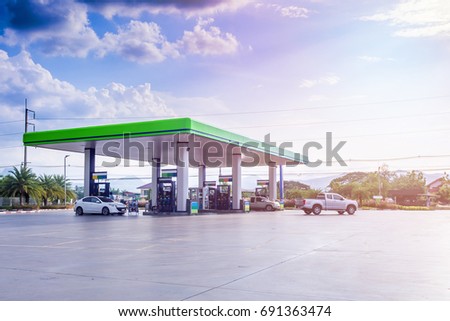Gas fuel station with clouds and blue sky Royalty-Free Stock Photo #691363474