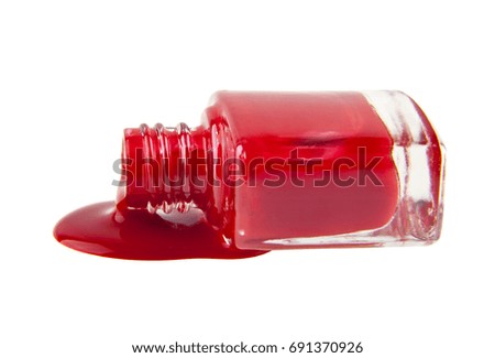 Bottle with red nail polish isolated on white background