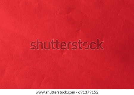 Close-up of dark red paper texture background