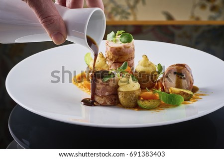 Beautiful and tasty food on a plate
 Royalty-Free Stock Photo #691383403