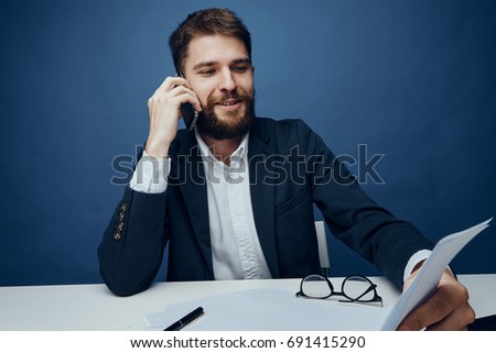  Business man talking on the phone and smiling, busy                             