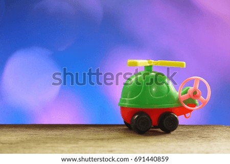  Helicopter toy on blurred background,