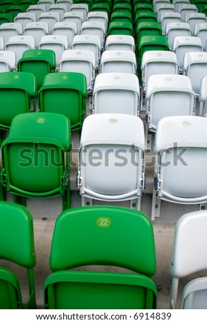 A nice picture of green and white stadium seats