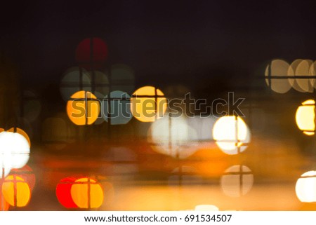 Traffic lights make blur at night.