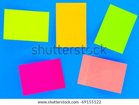 an empty color sticky notes on blue