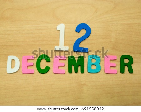 DECEMBER word made with wooden alphabet shape