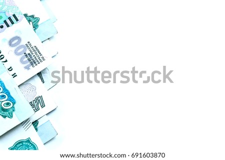 row of banknotes isolated on white background