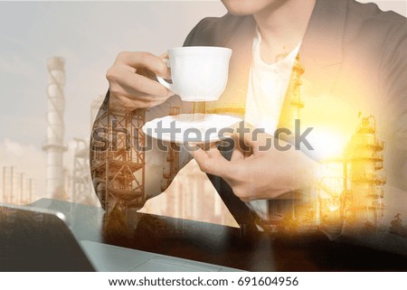 Double exposure of businesswoman drink a coffee, oil fuel, Electric generating factory, plant and sunset as business, relax, industrial and energy concept.