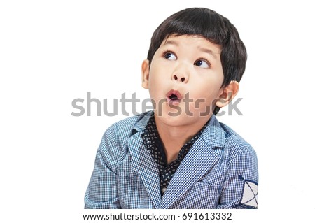 Asian boy is making expression isolated over white Royalty-Free Stock Photo #691613332
