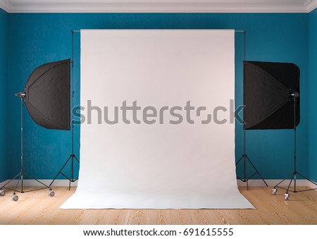 Interior of studio room with equipment. The sky-blue color of the walls. Lighting from the window.