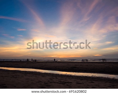 Sun glow and reflection in water surface during sunset