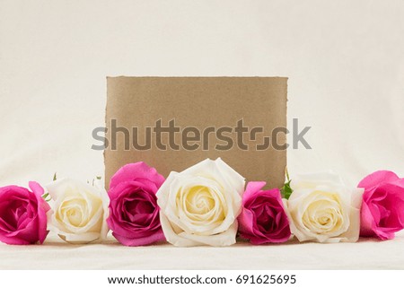 Blank brown card with pink and white roses 