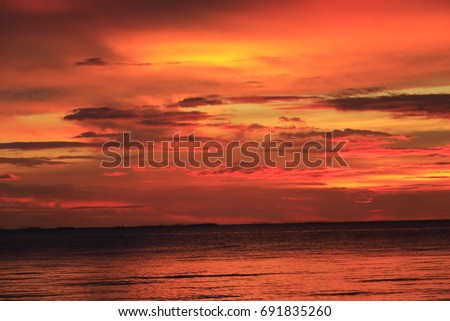 The gorgeous sunset that is overlaying on the deep asian ocean.