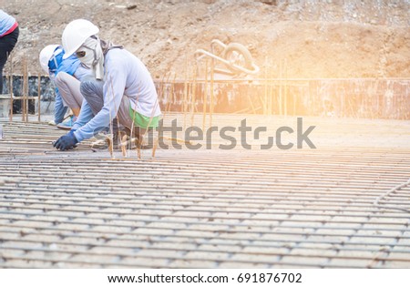 Rebar Steel for Foundation of Construction work with worker.