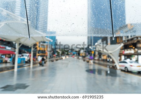 abstract blur Street view of Haeundae Town with rainy for background