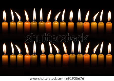 Candle flame, Group light candle burning brightly in the black background