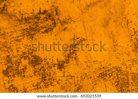 Orange grunge wall background.