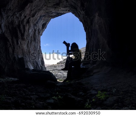 guy who takes pictures in the cave