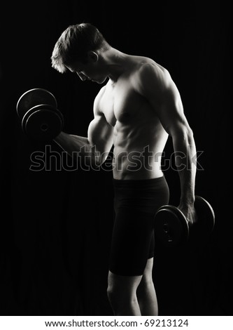 Fitness man, low key Royalty-Free Stock Photo #69213124