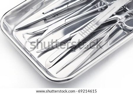 Medical instruments in a steel tray Royalty-Free Stock Photo #69214615