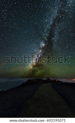 "Observatories and the Milky Way"  Telescopes on the summit of the Haleakala volcano on Maui.  The 10,000 foot elevation and lack of light pollution makes perfect conditions for observing the heavens.