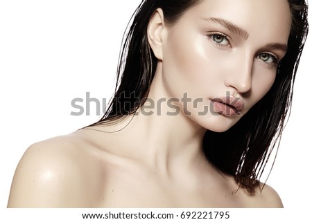 Beautiful Face of young Woman. Skincare, Wellness, Spa. Clean soft Skin, healthy Fresh look. Natural daily makeup, wet hair style
