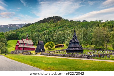 Impressive summer view of Borgund Stave Church, located in the village of Borgund in the municipality of Lerdal in Sogn og Fjordane county, Norway. Traveling concept background.
