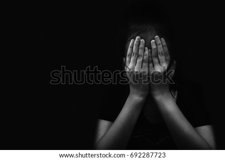 fear children hand cover face imprison Child Abuse in white tone Royalty-Free Stock Photo #692287723