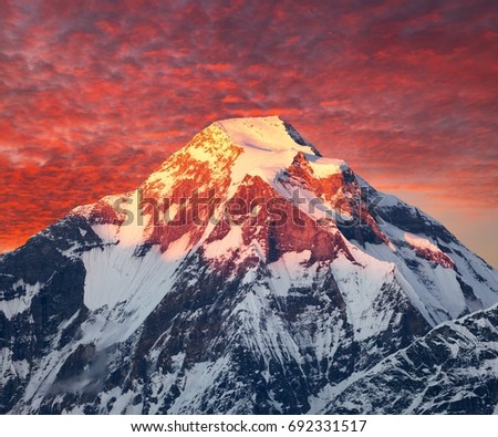 Mount Dhaulagiri, evening sunset view of mount Dhaulagiri, Himalayas, Nepal Royalty-Free Stock Photo #692331517