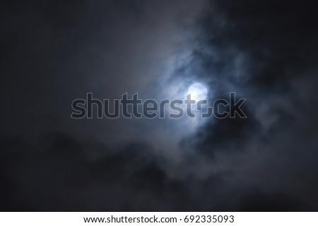 Dark cloud on night with lighting of the moon.