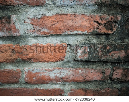 Old red brick wall for background