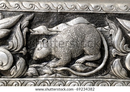 Silver plate engraving rat Northern Thai craftsmanship.