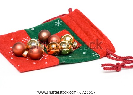 christmas glass balls and sock isolated on white