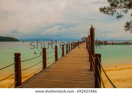 Beautiful landscape with pier, view from Manukan island to sea and Islands. Sabah, Malaysia.