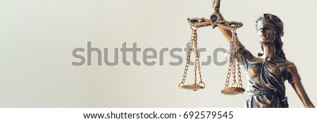 The Statue of Justice - lady justice or Iustitia / Justitia the Roman goddess of Justice Royalty-Free Stock Photo #692579545