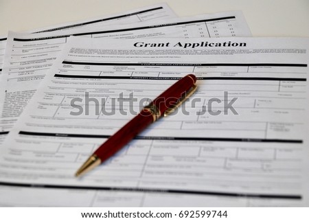 Grant Application Form Royalty-Free Stock Photo #692599744