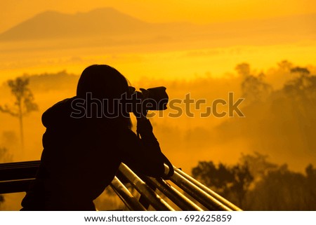 Silhouette of photographers in Sunrise