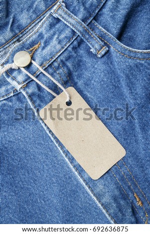 Background denim texture with cardboard label use for texts display