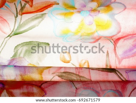 Fabric silk texture, abstract flowers drawn on the fabric