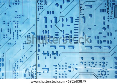 Modern background of blue circuit board on concrete cemented wall. template for design. Color year 2020, classic blue, trendy color