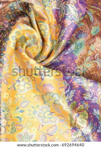 brocade fabric texture.  painted with a pattern of flowers