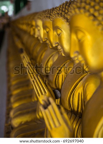 Buddha statue in temple of Thailand.