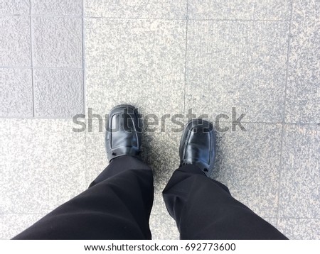 The man is walking on street for work,this image for business concept.