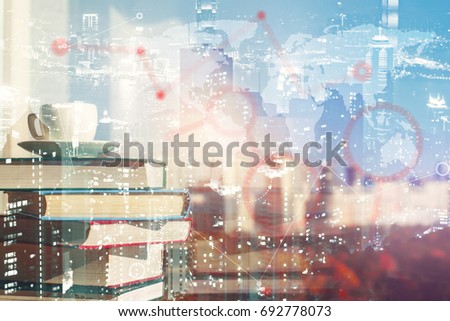 Pile of books and coffee cup on abstract city background with map and graph. Education concept. Double exposure 