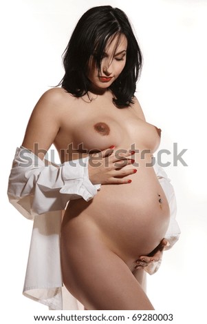 beautiful pregnant woman in an artistic photo shoot