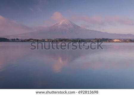 The reflection of Fuji mountain over Lake Kawaguchi at morning.